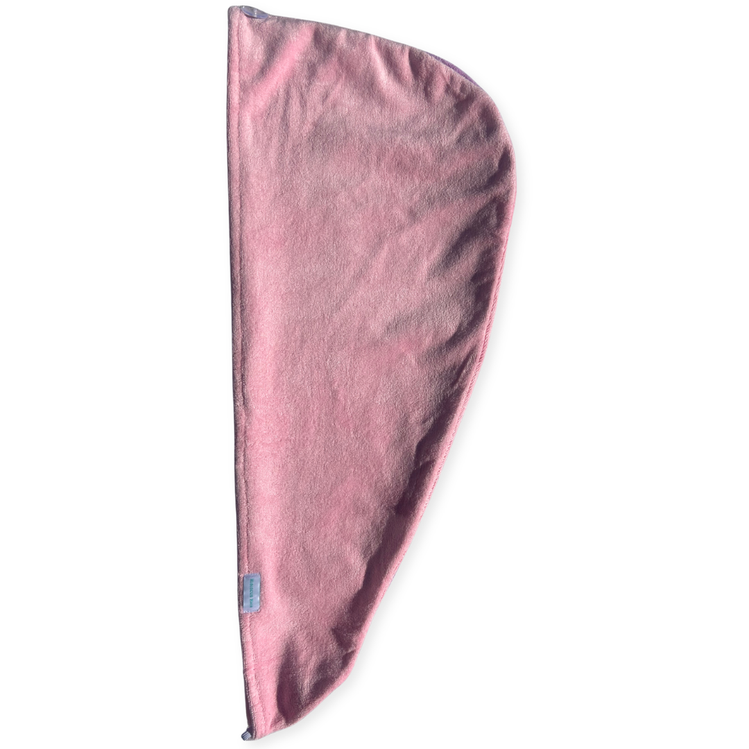 A dusty pink fleece microfibre hair wrap.