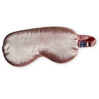 A satin sleep mask in a dusty rose with a matching elastic strap, shown against a plain white background.